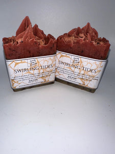 Two red soap bars with 'Swirling Tides' packaging on a white background